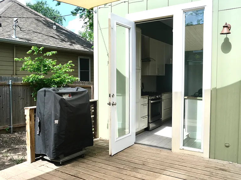 Large deck directly off the kitchen with easy access grilling. (Weber Grill provided)