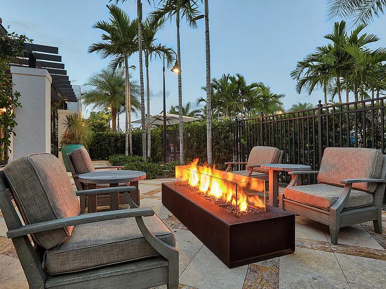 Outdoor lounges, including a firepit, allow you to enjoy the Florida weather throughout the year.