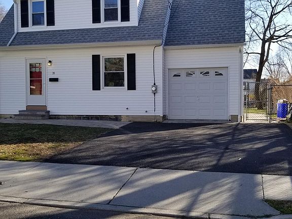 Driveway is two cars wide.