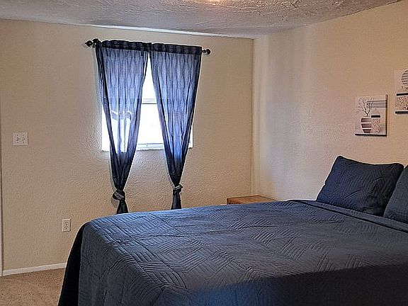 Bedroom has rear entrance