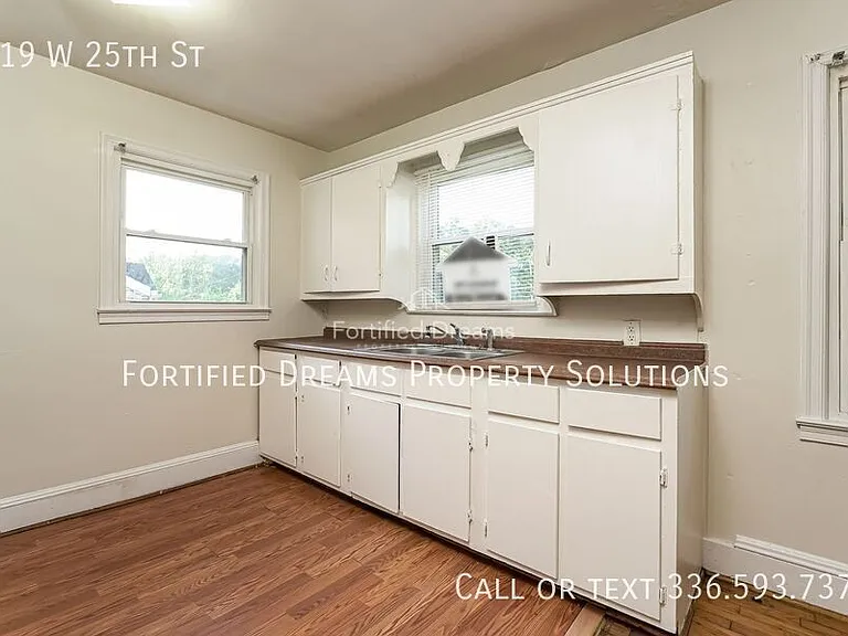 319 W 25th St — Photo 7