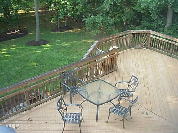 Large deck overlooking yard