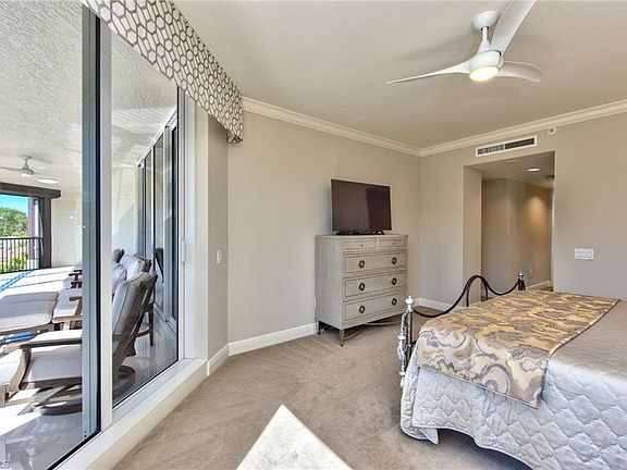 5th image of 8960 Bay Colony Dr APT 203