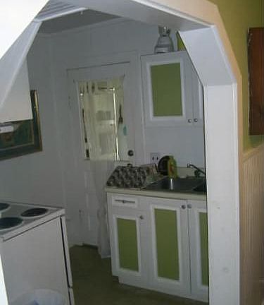 Kitchen leading to Laundry