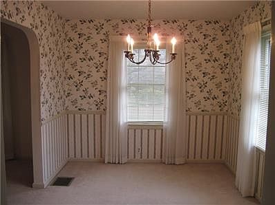 View of dining room with arched doorway
