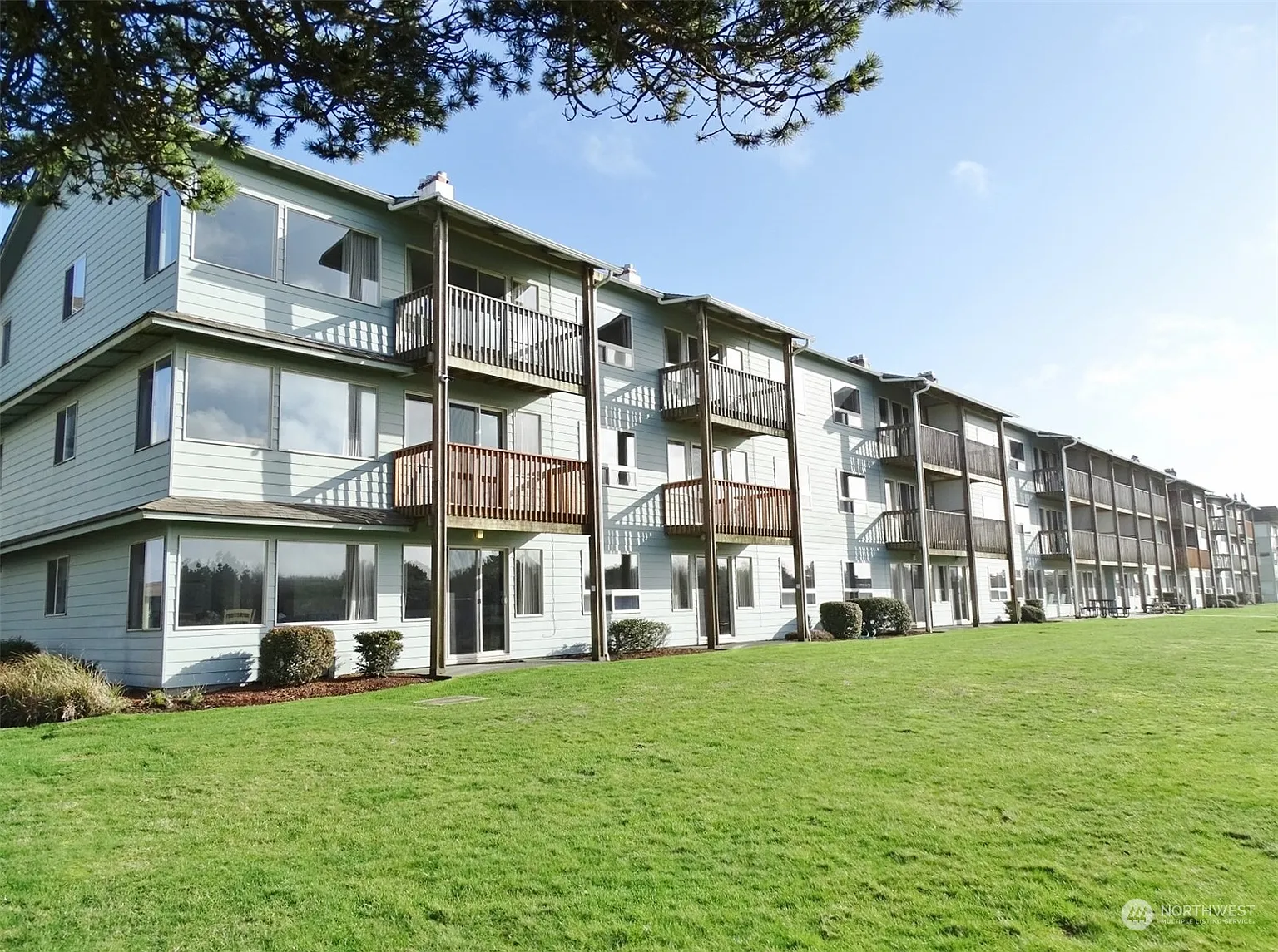 643 Ocean Shores Boulevard NW #112 photo 1