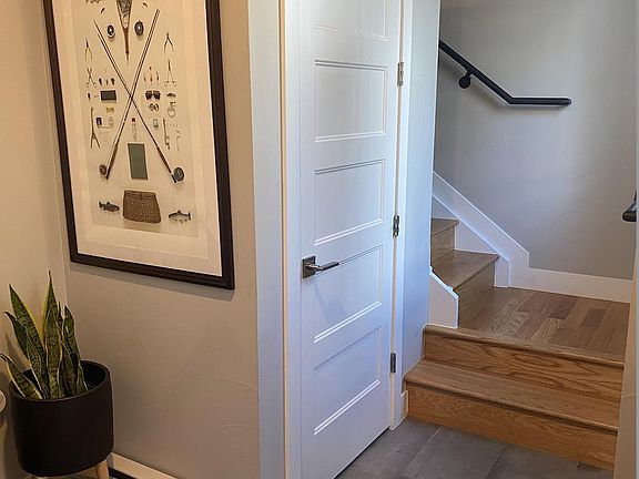 Entry way with coat closet and bathroom