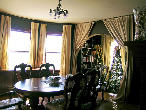 Formal Dining Room w/ Fireplace and Library Alcove