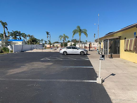 Parking lot by office/pool/laundry/clubhouse