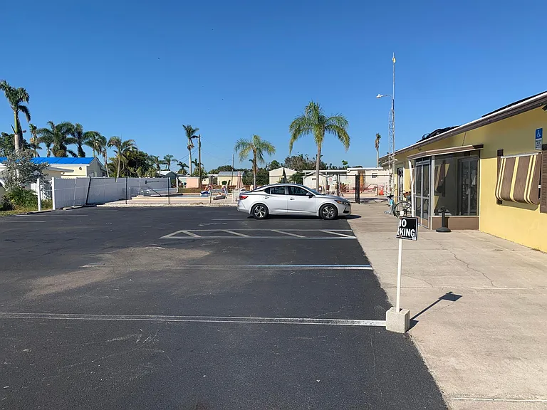 Parking lot by office/pool/laundry/clubhouse