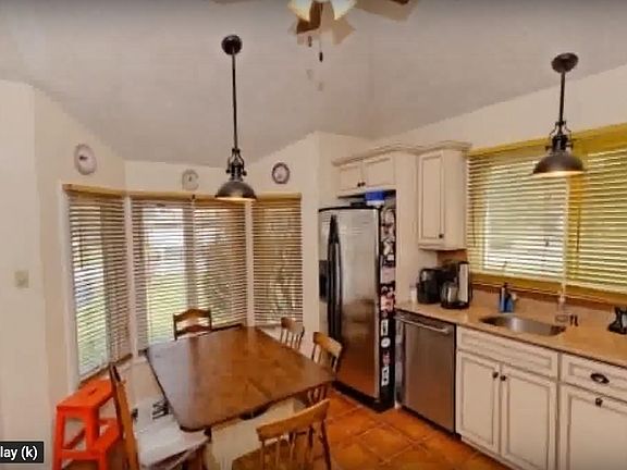 Kitchen is big enough to fit in a dining table with chairs. Sink with garbage disposal.