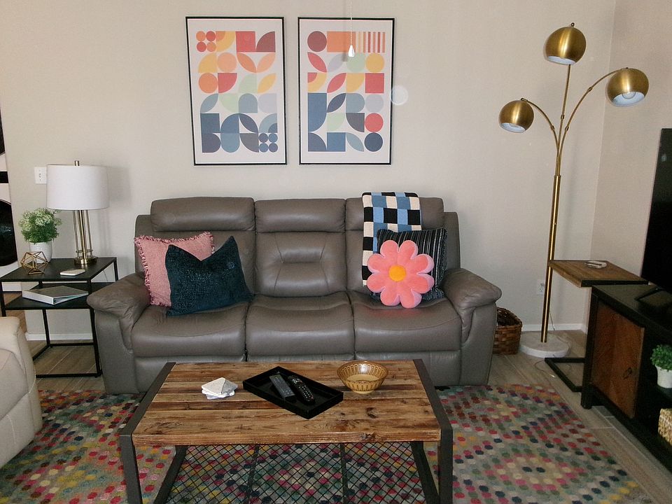 Large multi color rug on tile floor