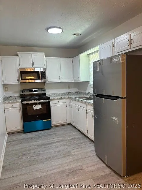 3 bed, 1.5 bath, 1188 sqft, $1,100 — Photo 3
