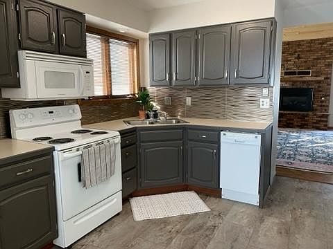 Kitchen-lots of natural light and room for table and chairs for in kitchen dining.