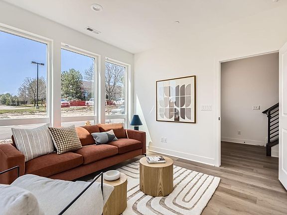 Lower-level flex room perfect for a home office, secondary living area, or guest room