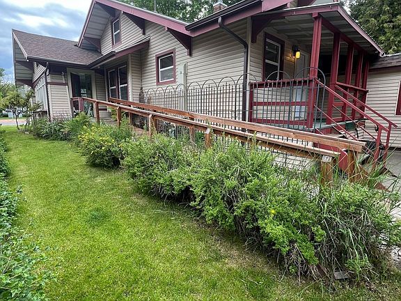 View of Side of House, ADA Friendly Ramp Entrance into Sunroom/House