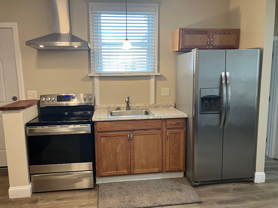 Full kitchen with stainless steel appliances