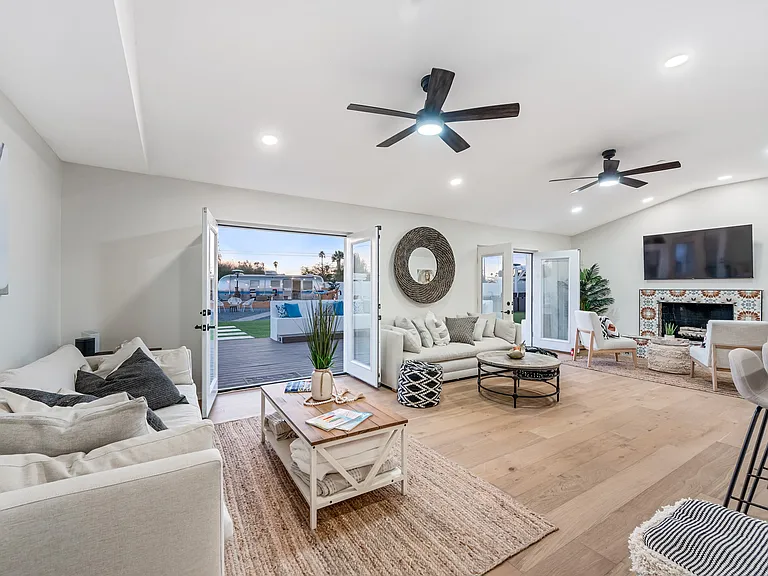 Living space with French doors to outdoor oasis
