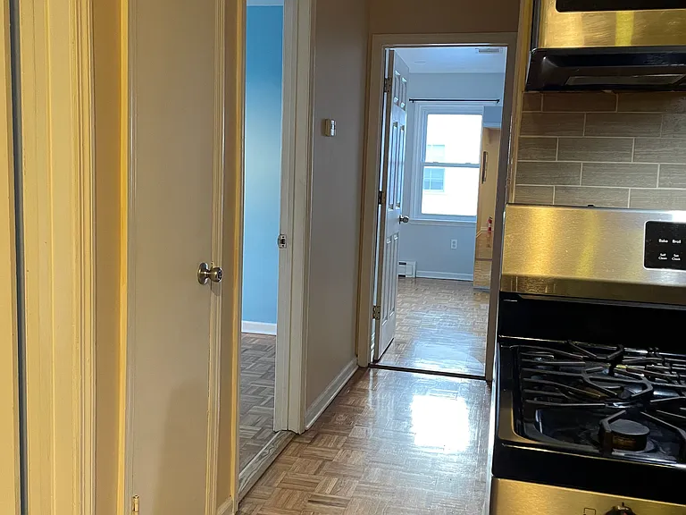 Hallway leading towards the 2 bedrooms, Master bedroom (with private bathroom) and a full bathroom