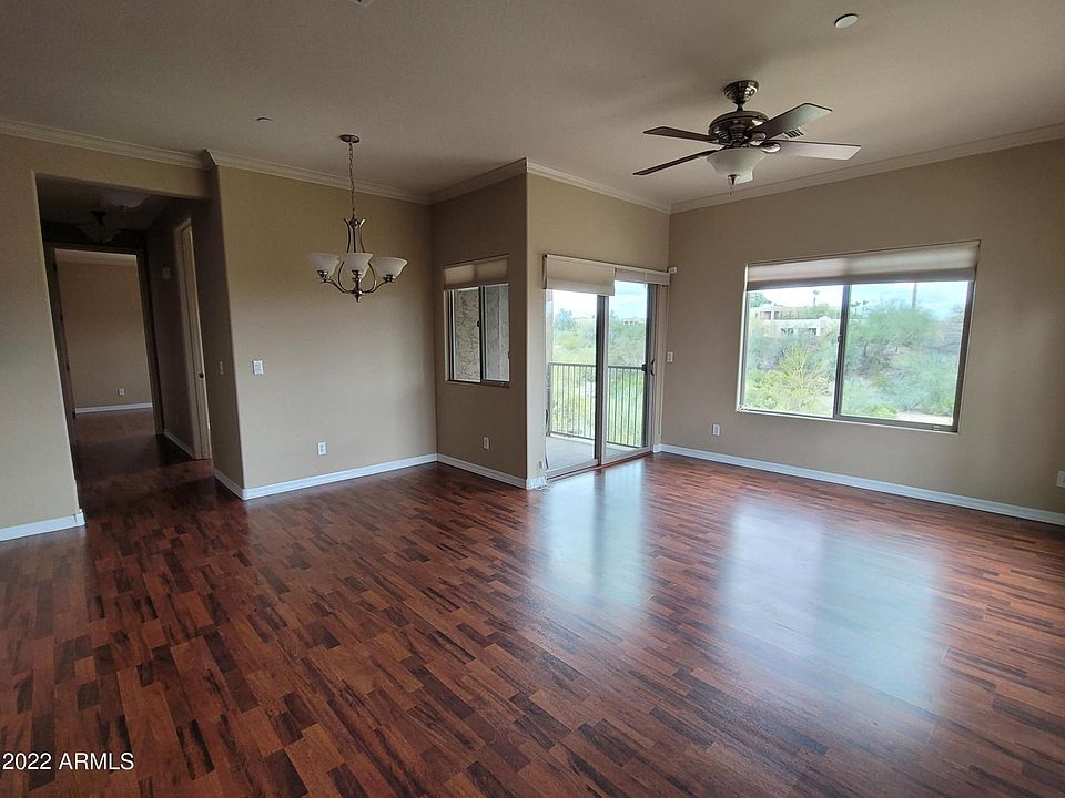 WALK INTO THE GREAT ROOM WITH BEAUTIFUL PRESERVE VIEWS & MORE PRIVACY OF AN END UNIT!