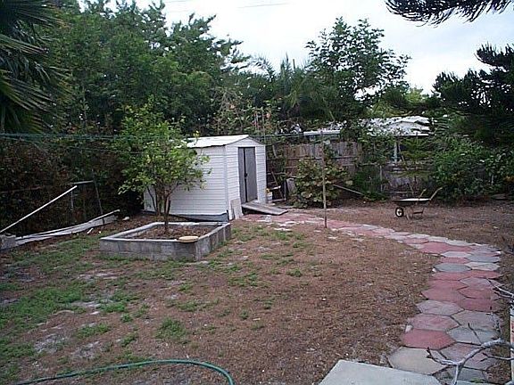 Rear Yard W/Storage Bldg