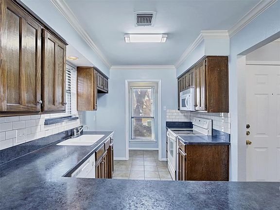 Great Kitchen designed for entertaining with tons of storage.