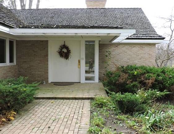 Paved front entry and courtyard 