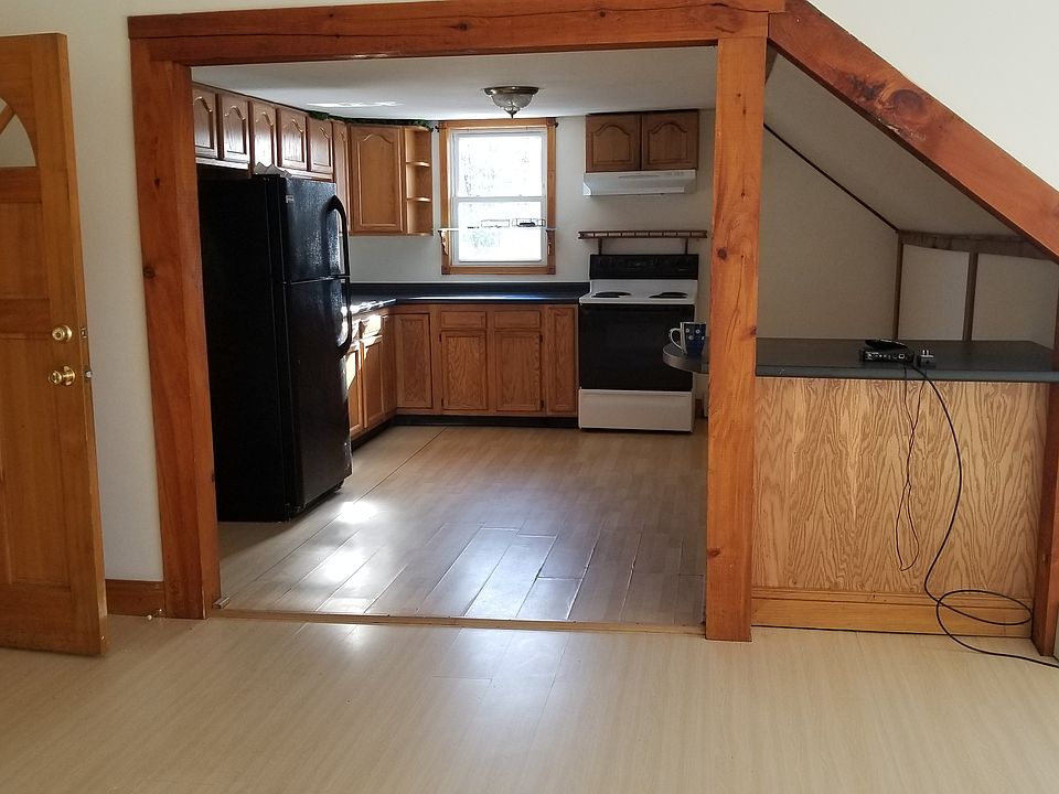 living room to kitchen..laminate flooring has been replaced this year. Updated picture needed.