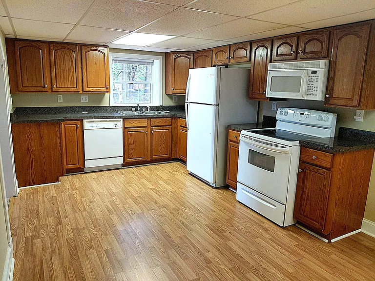 Additional kitchen view highlighting layout, storage, and workspace