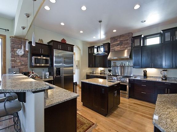 Gourmet Kitchen with Slab Granite