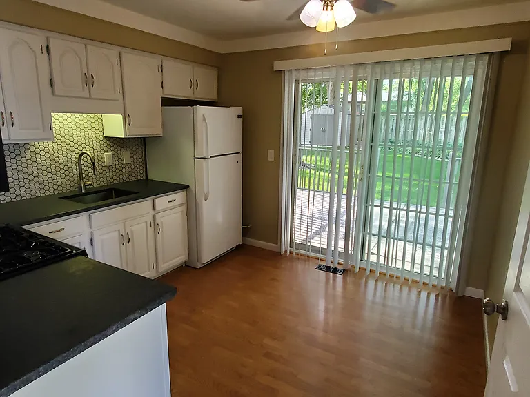 Kitchen with Deck to Backyard
