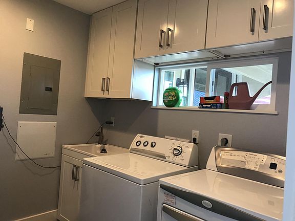 Plenty of room for washer, dryer and sink