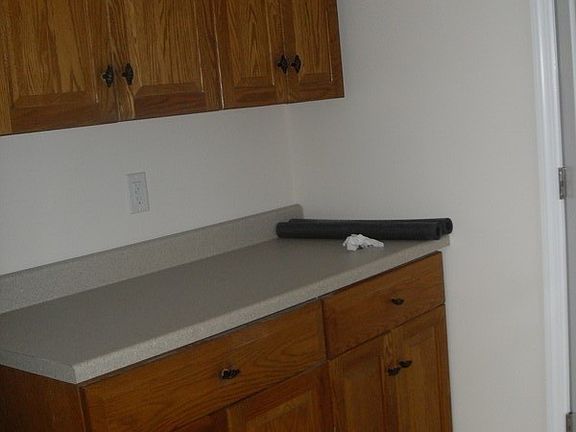 Modern Kitchen : Open Kitchen with Granite Counters, Porcelain Tile, Stainless Steel.