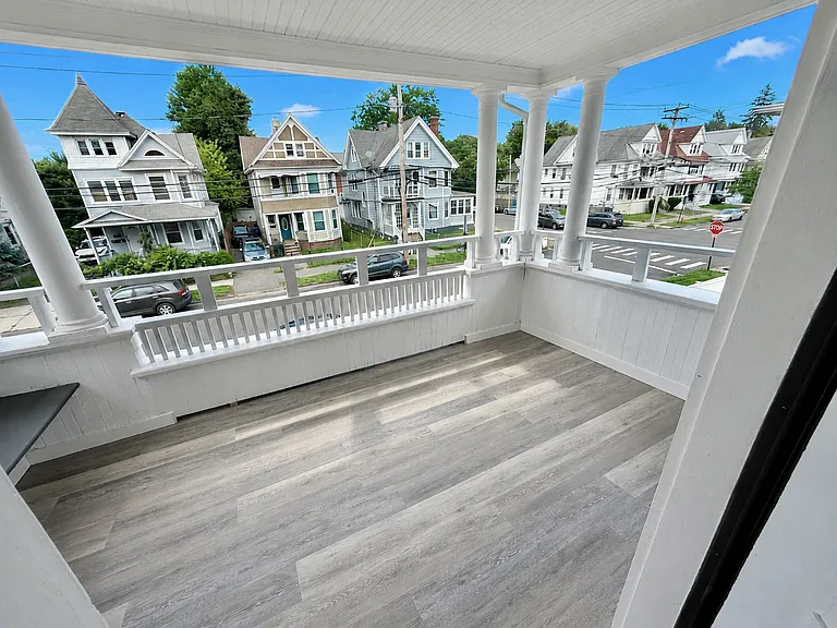 Covered front porch with seating