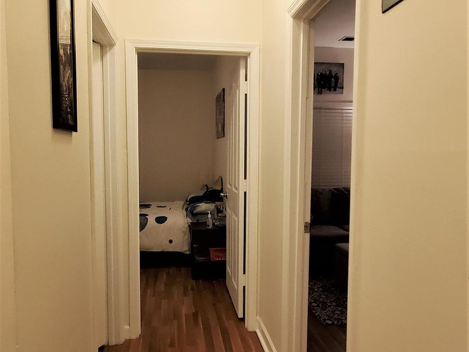 Hallway to 2nd bedroom and bonus room