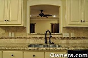 Kitchen look through window to Living Room