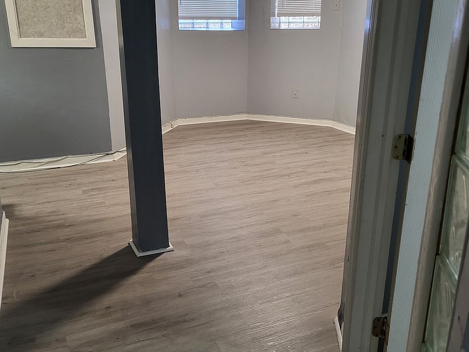 Livingroom and main door to bedroom