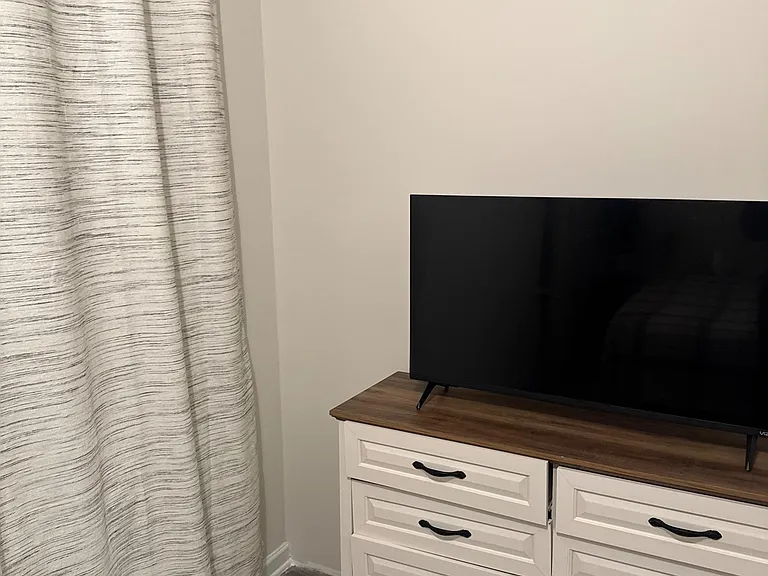 40 inch Television with dresser.