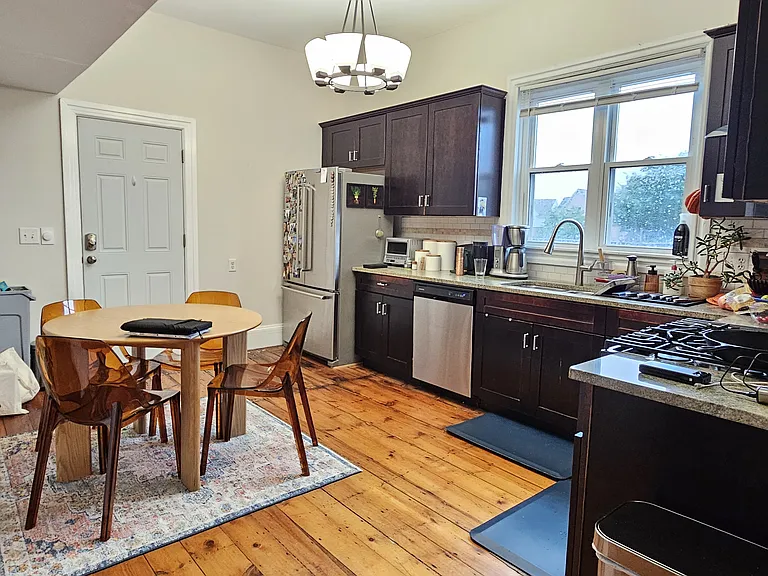 Roomy eat-in kitchen with stainless appliances