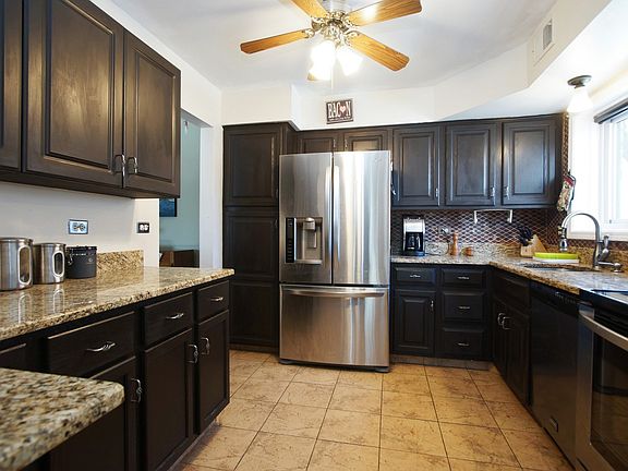 Granite counter tops and stainless steal appliances (2 years old)