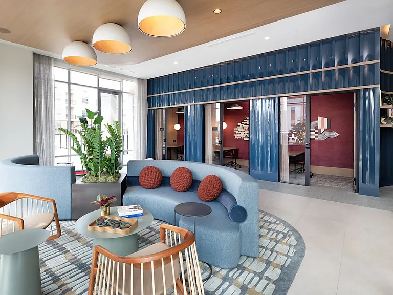 Lower-level lounge with private work pods