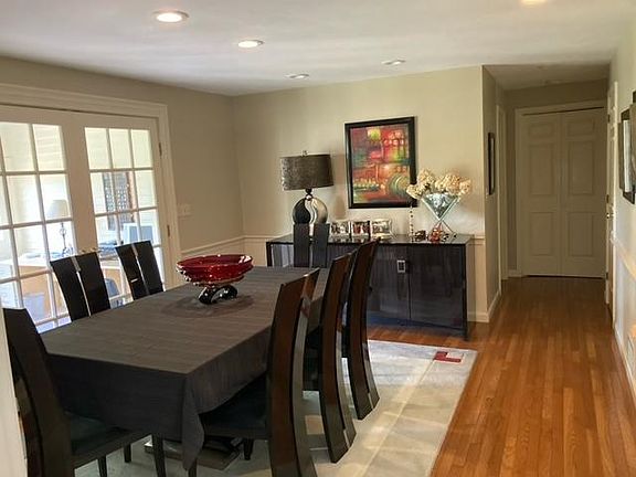 Dining room, French doors to sunroom.