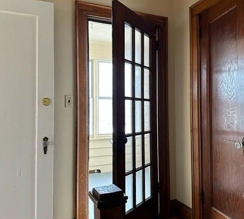 Landing, sunroom, and coat closet