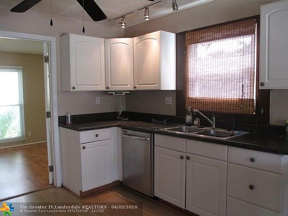 4th image of 10988 NW 8th Ct