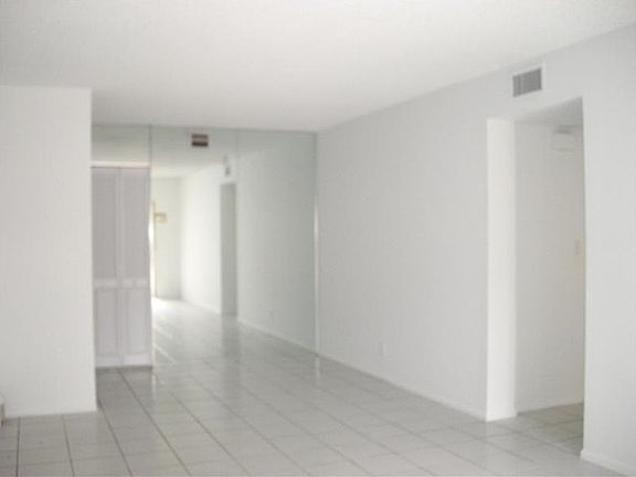 2nd image of 704 Gardens Dr APT 104