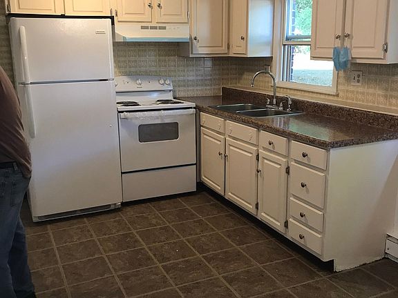 Lots of cabinets eat in kitchen