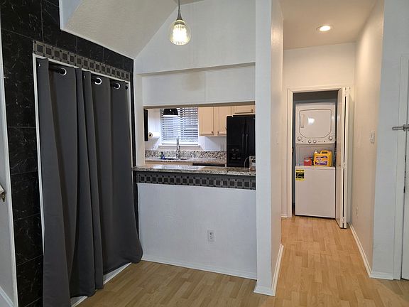 Bar area, storage, and washer and dryer