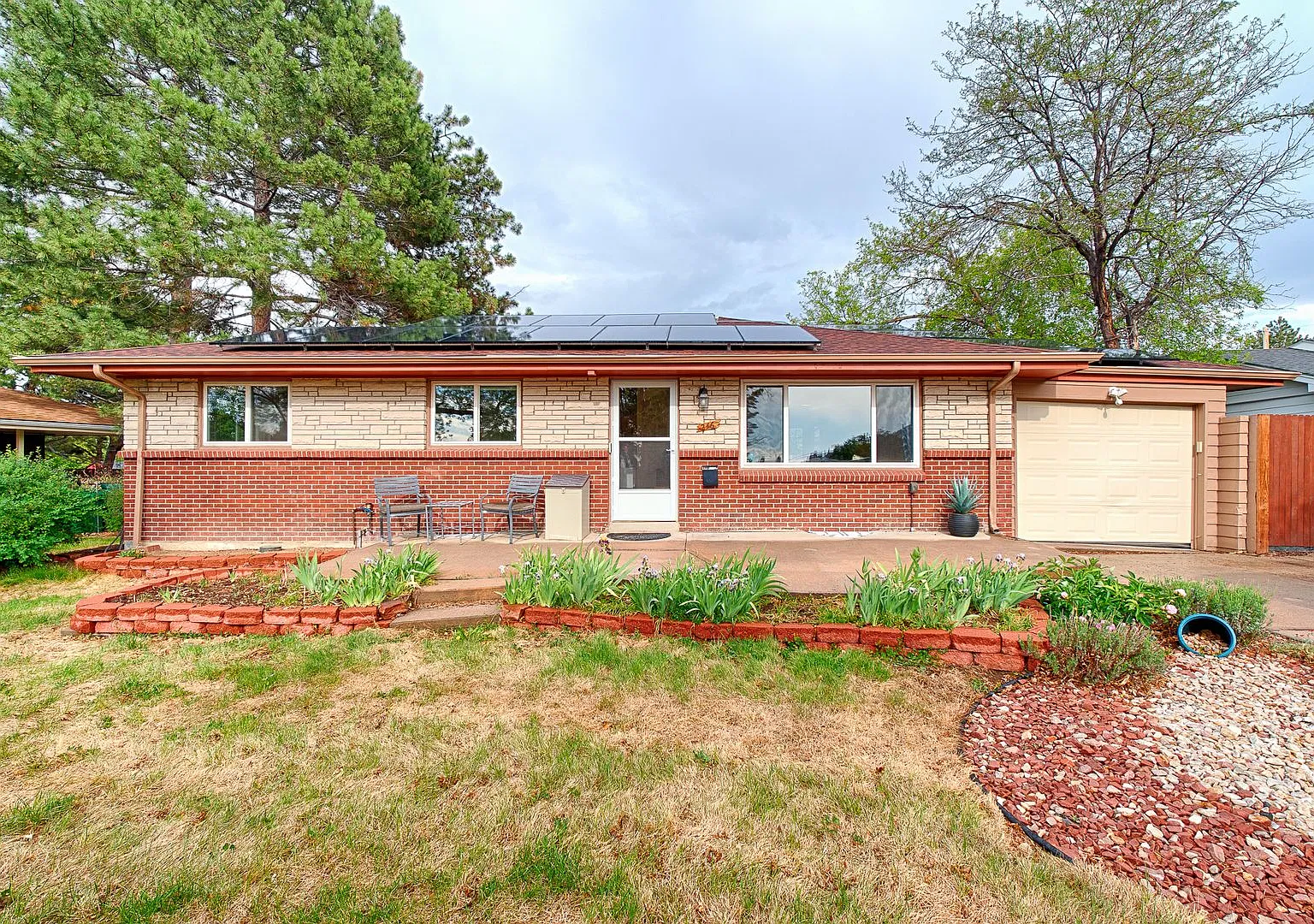 Mid-Century Charm Meets Modern Comfort | 4BR Aurora Home with Finished Basement — Photo 1