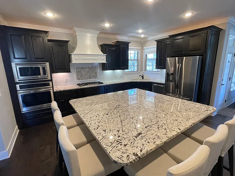 Chefs Kitchen with massive island with seating for 6