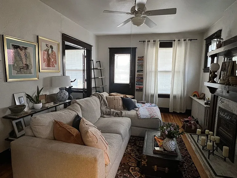 Living room, door to front balcony patio